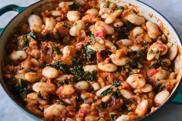 pizza beans before topping with three different cheeses