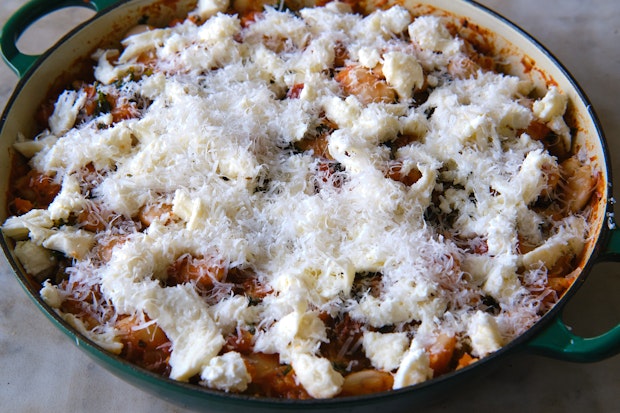 pizza beans assembled and ready to be baked in an oven