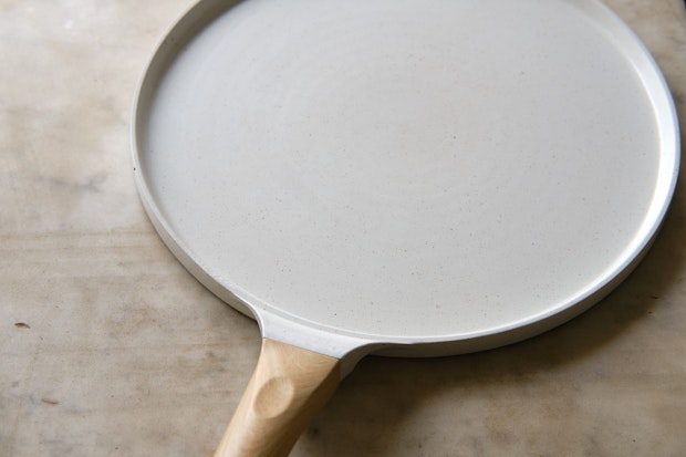 white ceramic non-stick crepe pan with wood handle