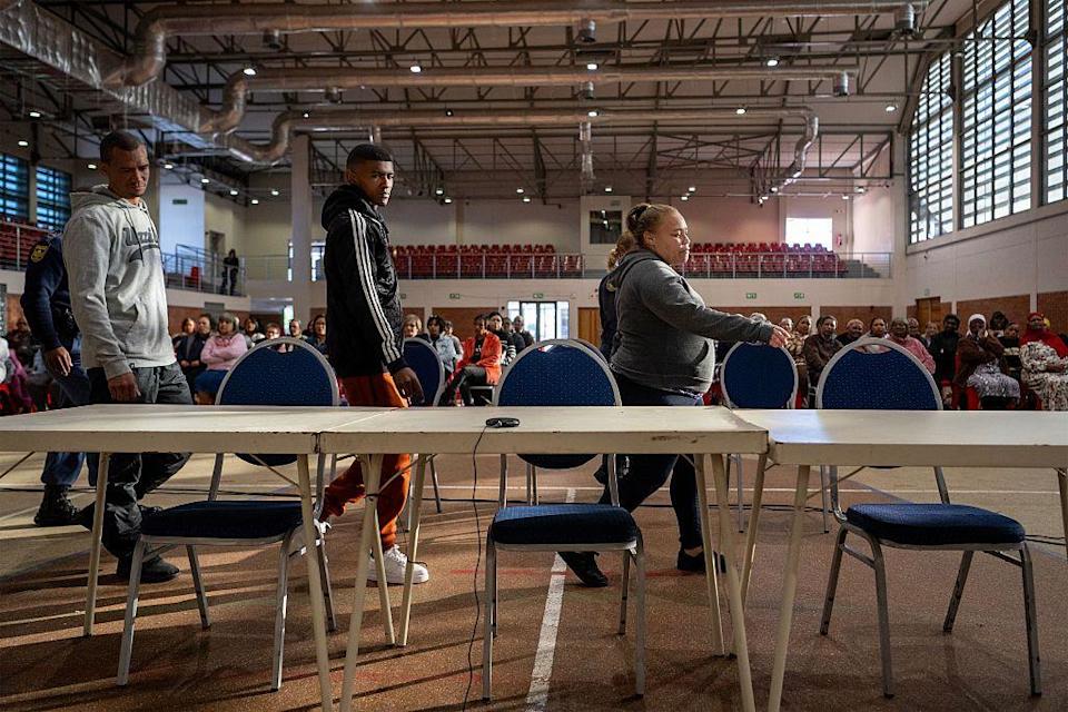 The three accused walking in for a sentencing hearing in Saldanha Bay in a community centre - 27 May 2025.