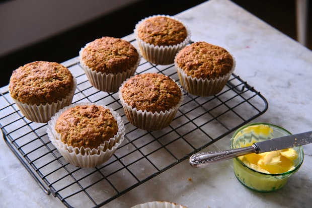 bran muffins cooling on a rack after baking