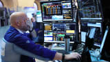 Traders work on the floor of the New York Stock Exchange during morning trading on Aug. 22, 2025 in New York City.